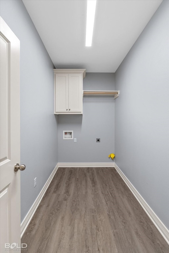 clothes washing area with hookup for a washing machine, baseboards, dark wood-style flooring, and electric dryer hookup