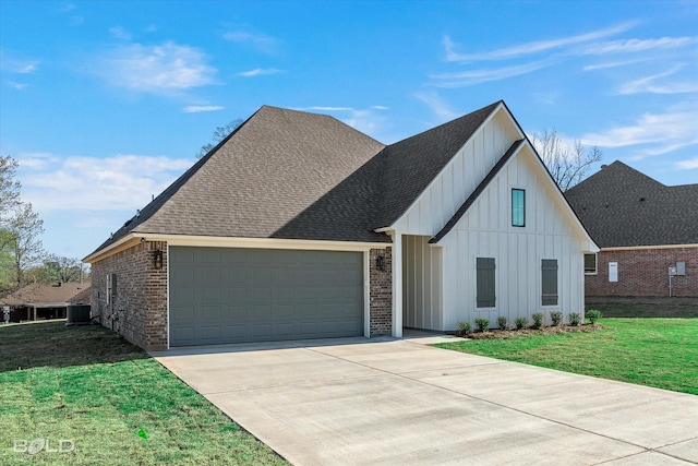 view of front of property featuring board and batten siding, concrete driveway, a front yard, cooling unit, and an attached garage