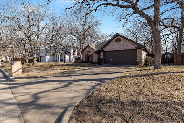 single story home featuring a garage