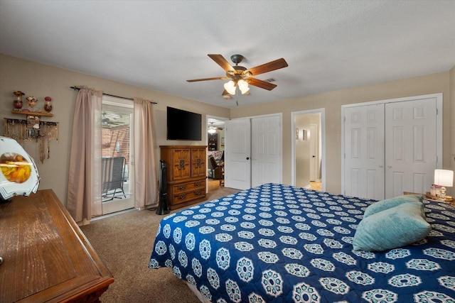 bedroom featuring access to exterior, carpet flooring, ceiling fan, and multiple closets