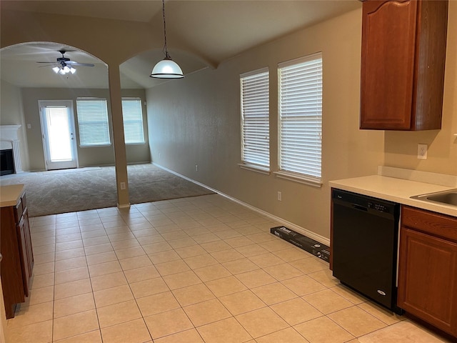 kitchen with ceiling fan, light tile patterned floors, black dishwasher, and pendant lighting