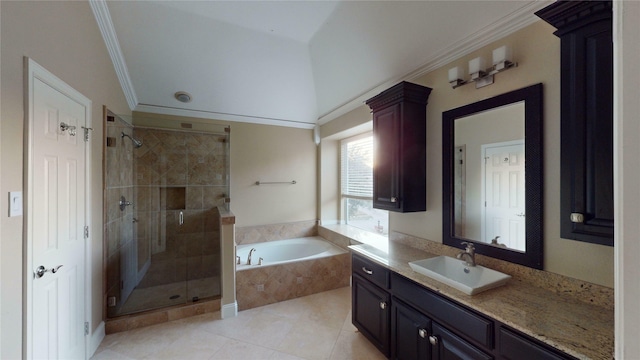 bathroom with tile patterned flooring, vanity, ornamental molding, and plus walk in shower