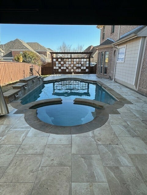 view of pool featuring a patio