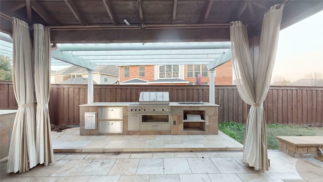 patio terrace at dusk with area for grilling