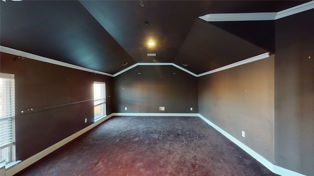 bonus room featuring lofted ceiling and dark carpet