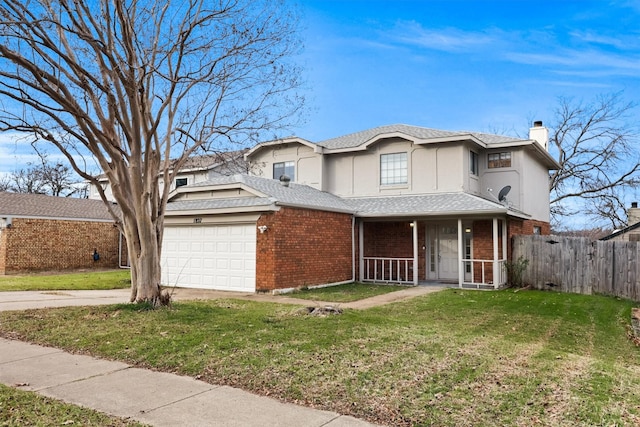 view of front of property with a front lawn, a garage, and a porch