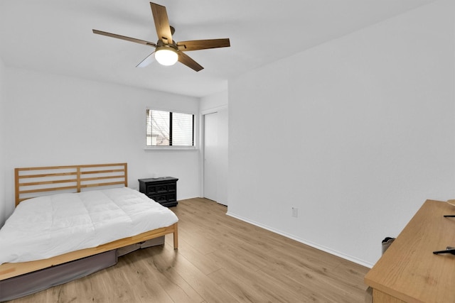 bedroom featuring ceiling fan and hardwood / wood-style floors