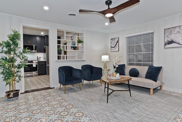 living room with ceiling fan