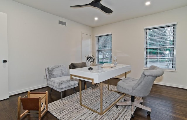 office space with dark wood-type flooring