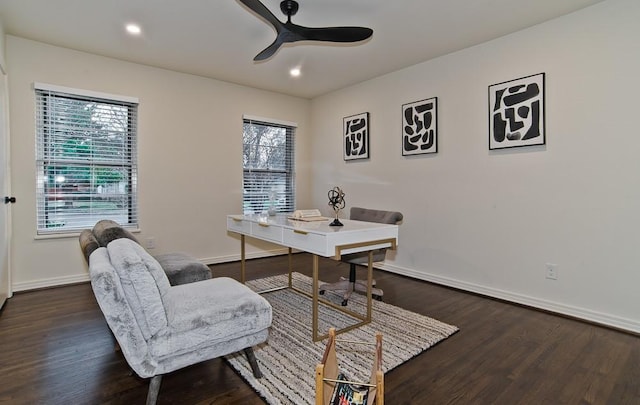 office featuring dark wood-type flooring and ceiling fan