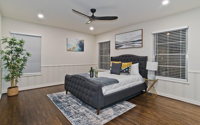 bedroom with dark wood-type flooring and ceiling fan