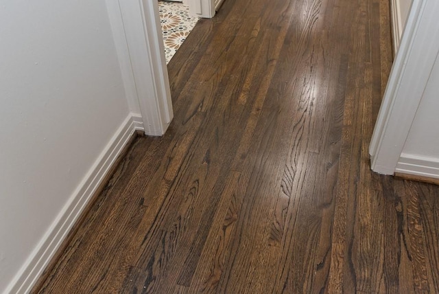 interior details featuring wood-type flooring