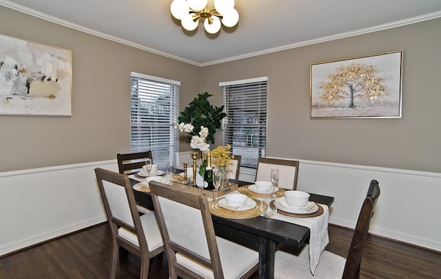 dining space with a notable chandelier, crown molding, and dark hardwood / wood-style floors