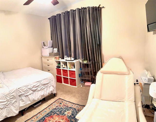 bedroom featuring ceiling fan and carpet flooring