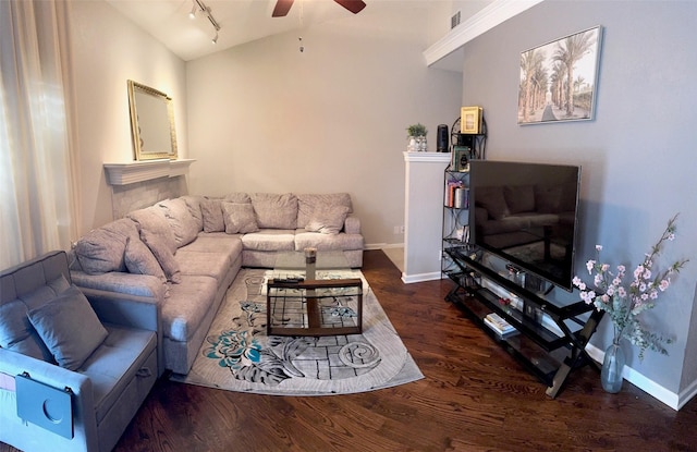 living room with ceiling fan, dark hardwood / wood-style flooring, and track lighting