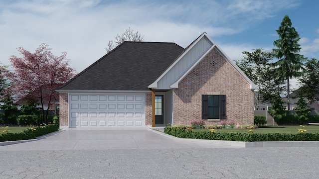 view of front of property featuring a front lawn and a garage