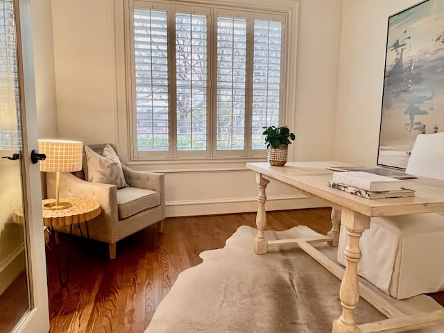 sitting room with hardwood / wood-style floors