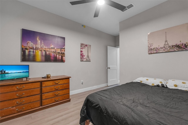 bedroom featuring ceiling fan and light hardwood / wood-style flooring