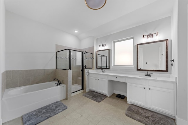 bathroom featuring vanity and plus walk in shower