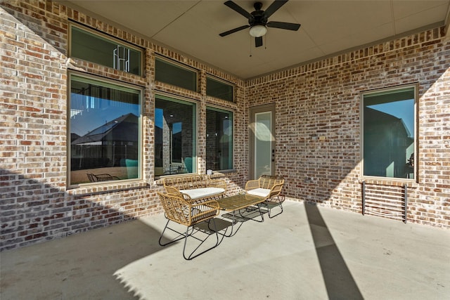 view of patio / terrace featuring ceiling fan