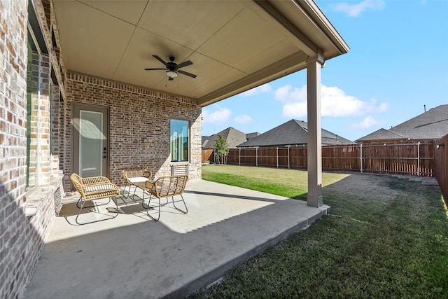 view of patio with ceiling fan