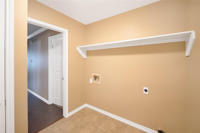 laundry room with electric dryer hookup, washer hookup, and light tile patterned floors