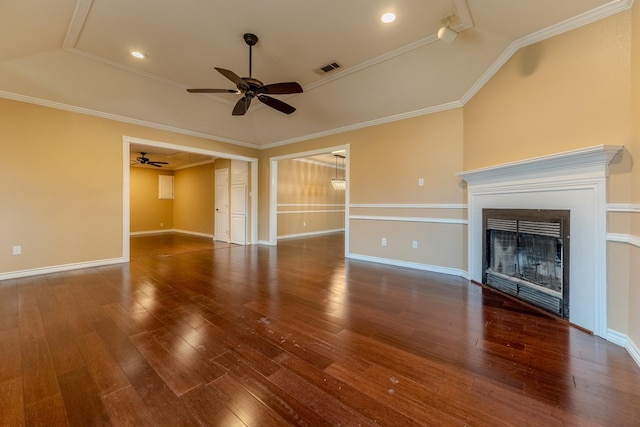 unfurnished living room featuring lofted ceiling, ceiling fan, dark hardwood / wood-style flooring, and crown molding