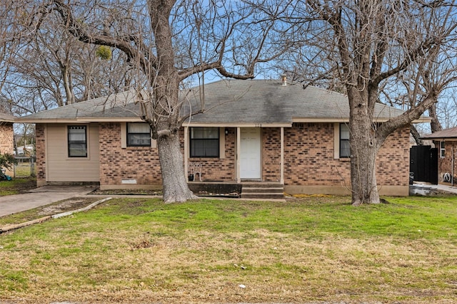 ranch-style home with a front lawn