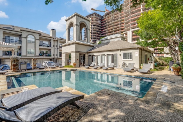 view of swimming pool featuring a patio