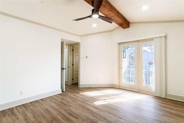 spare room with ceiling fan, crown molding, light hardwood / wood-style floors, and lofted ceiling with beams