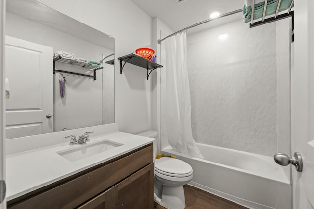 full bathroom featuring shower / bath combo with shower curtain, wood-type flooring, toilet, and vanity