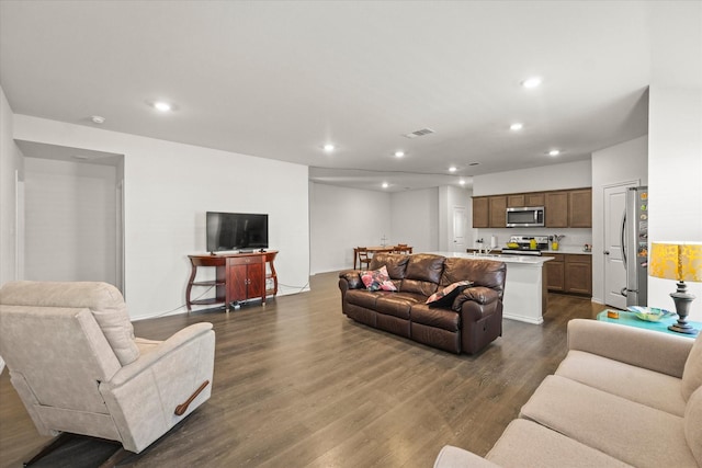 living room with dark wood-type flooring