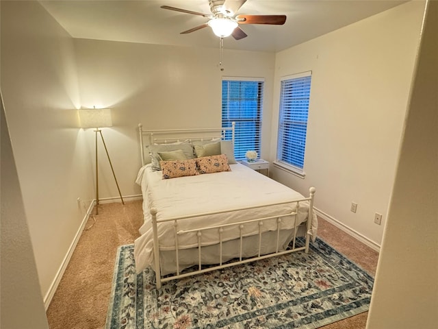 bedroom featuring ceiling fan and carpet floors