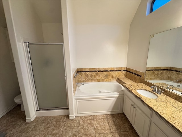 full bathroom with toilet, vanity, vaulted ceiling, tile patterned flooring, and shower with separate bathtub