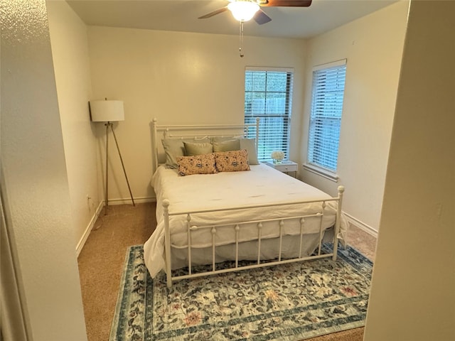 bedroom featuring ceiling fan and carpet flooring