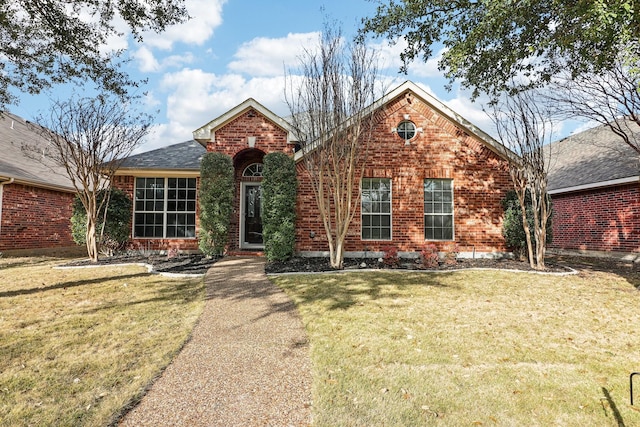 view of property featuring a front yard