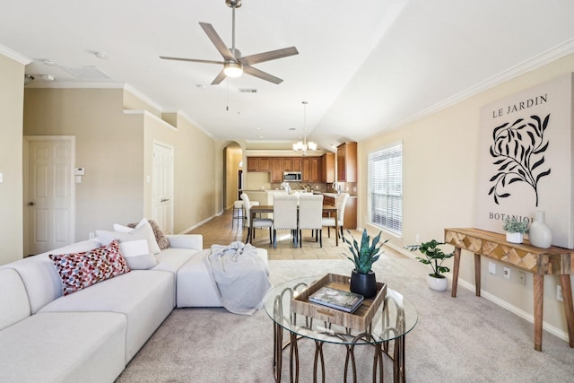 carpeted living room featuring ceiling fan with notable chandelier and ornamental molding