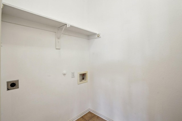 laundry room with hookup for a gas dryer, tile patterned floors, hookup for a washing machine, and electric dryer hookup