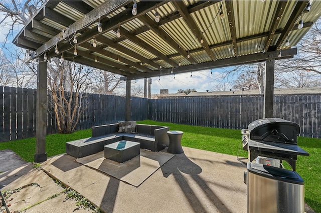 view of patio / terrace featuring an outdoor living space with a fire pit and grilling area