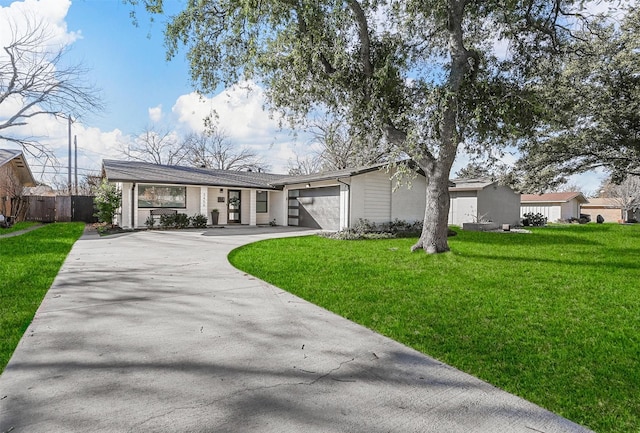 ranch-style house with a front lawn