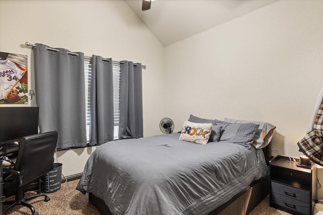 carpeted bedroom featuring ceiling fan and lofted ceiling