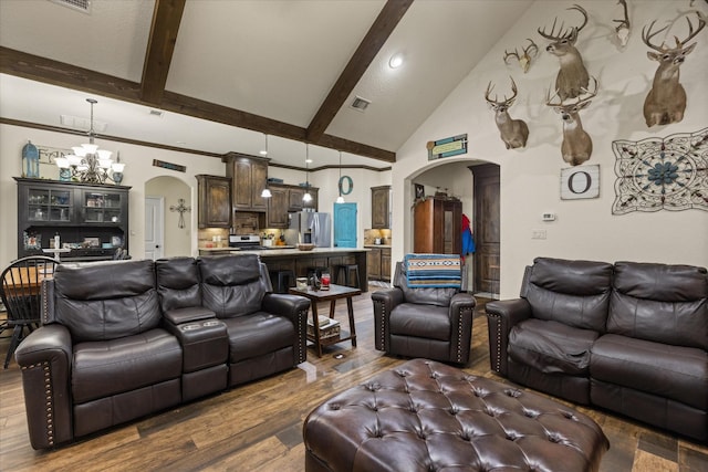 living room featuring beam ceiling, high vaulted ceiling, an inviting chandelier, and hardwood / wood-style flooring