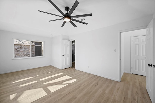 unfurnished bedroom featuring ceiling fan and light hardwood / wood-style flooring