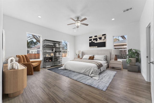 bedroom featuring hardwood / wood-style floors and ceiling fan