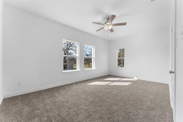 empty room with carpet and ceiling fan