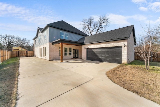 view of front of home with a garage