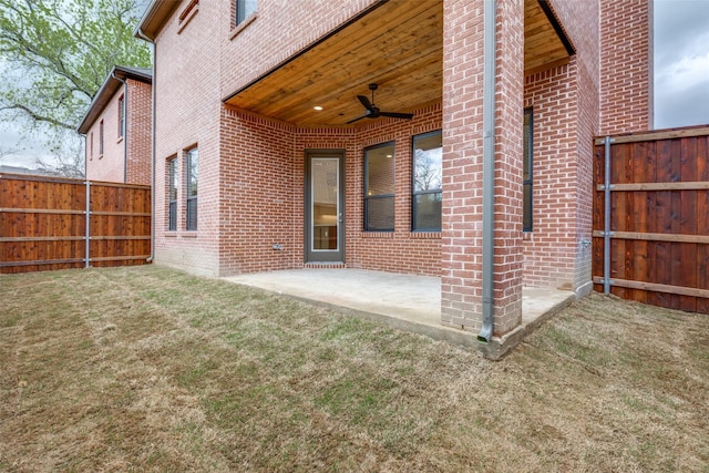 exterior space featuring ceiling fan