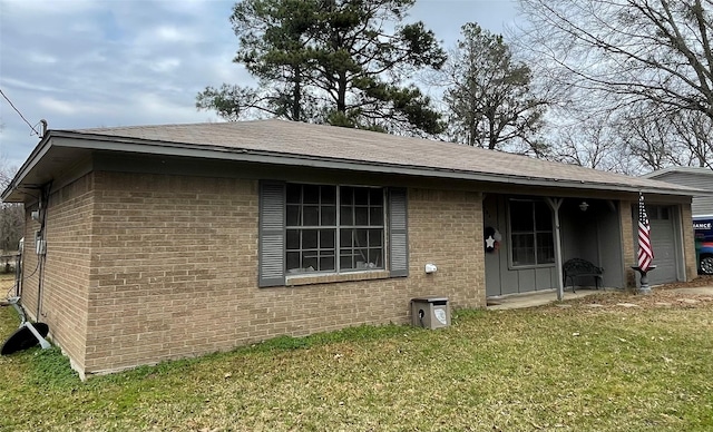 view of home's exterior featuring a yard