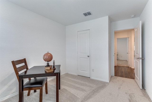 view of carpeted home office