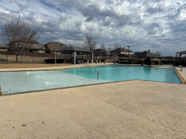 view of pool featuring a patio